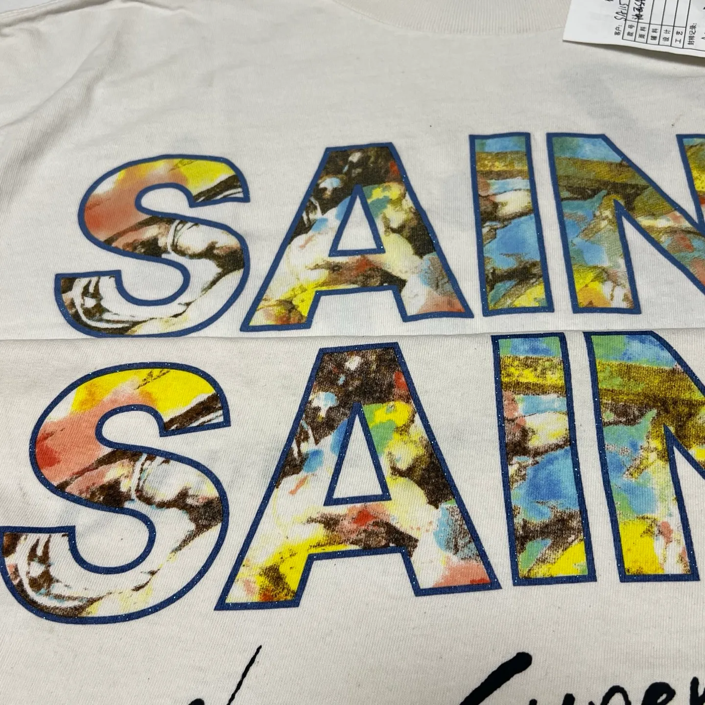 SAINT Mxxxxxx SS TEE/SUPER DIRTY/WHT oil painting SAINT SUPER DIRTY slogan TEE off-white S-XL Made of original OE yarn tube weaving without side seams to distinguish the split fabrics original consistent VINTAGE label/little angel anti-counterfeiting label top printing technology highly restored original details